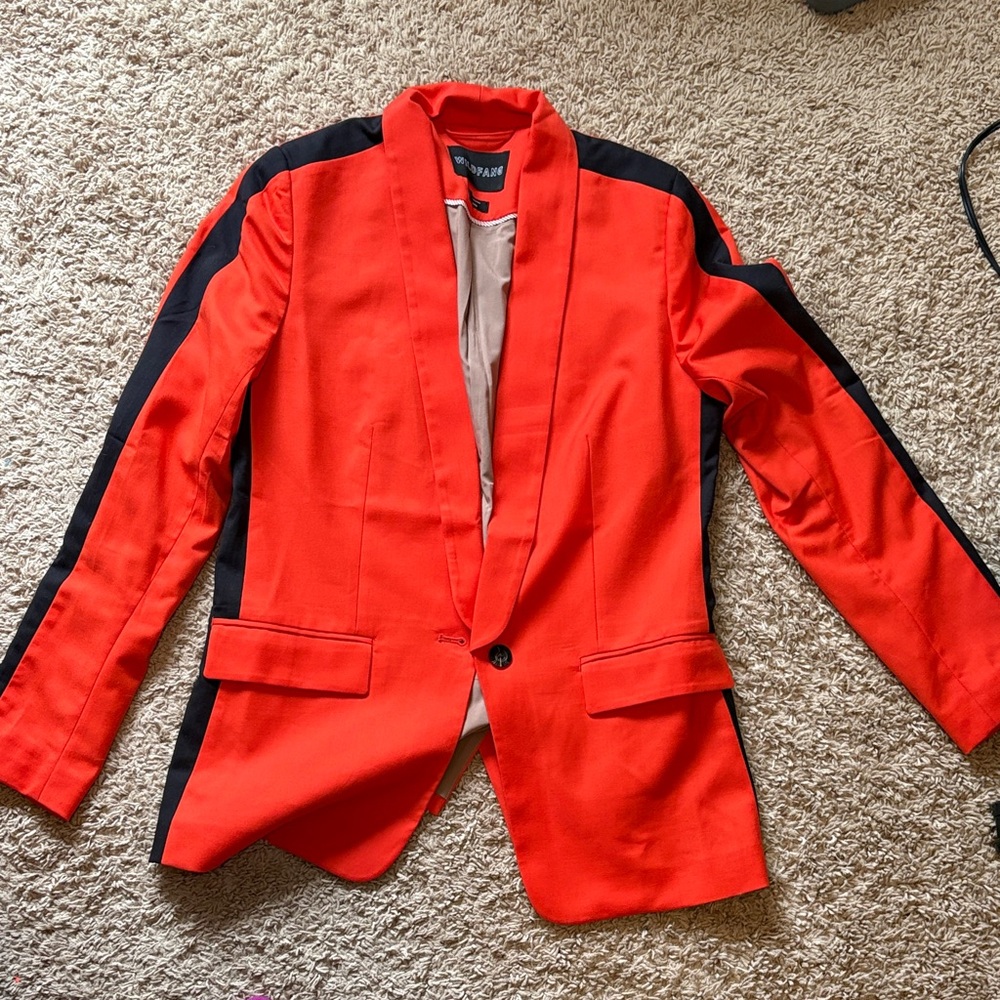 Vibrant orange blazer with Black Stripes